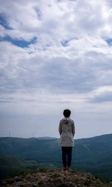 istock young woman Photographing landscape 842921694