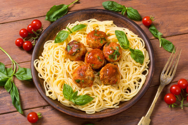 istock Spaghetti in pan with meatballs 842924344