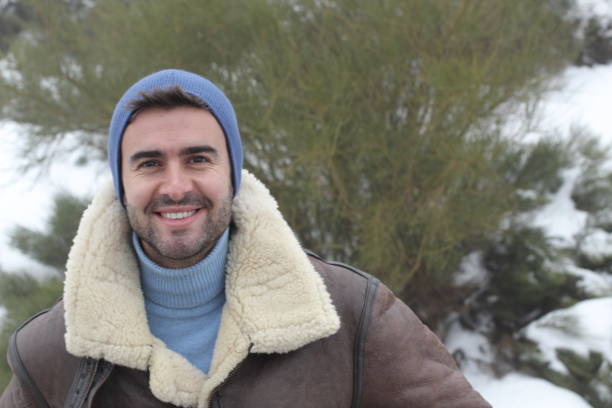 istock Handsome man smiling in the cold weather 842929136