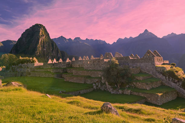 istock Pink sunrise light over machu picchu 842933166