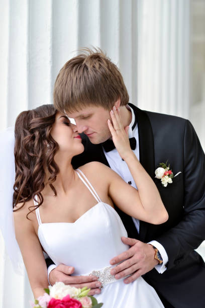 istock Wedding couple on the nature is hugging each other 842933228