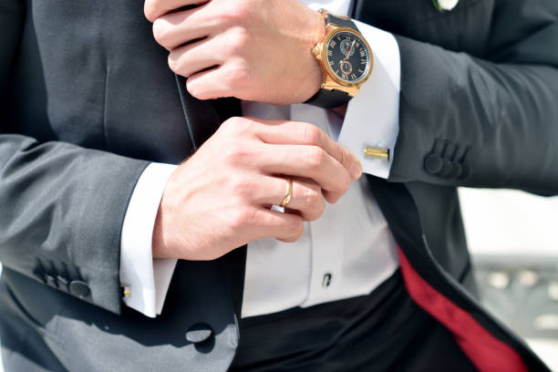 istock Groom is wearing cuff-links indoors 842936298