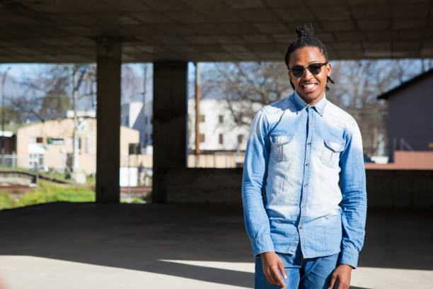 istock A happy young african black man with glasses 842938120