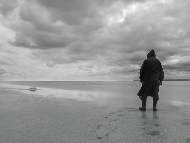 istock Lonely man in the lake 842938286