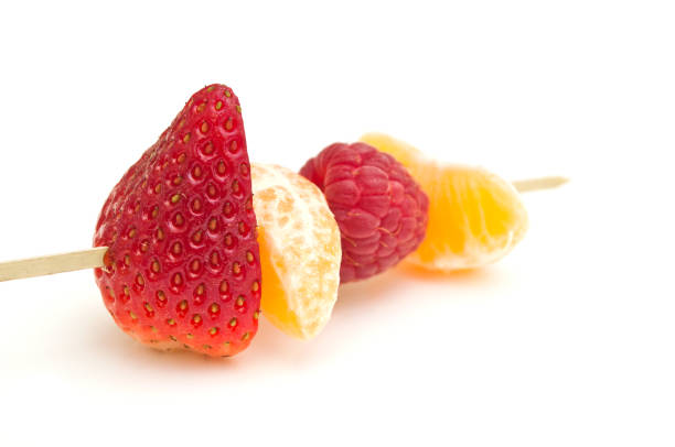istock one fruits skewer presentation on white background 842940504