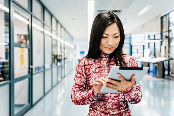 istock Asian Engineer With Digital Tablet In Factory 842940688