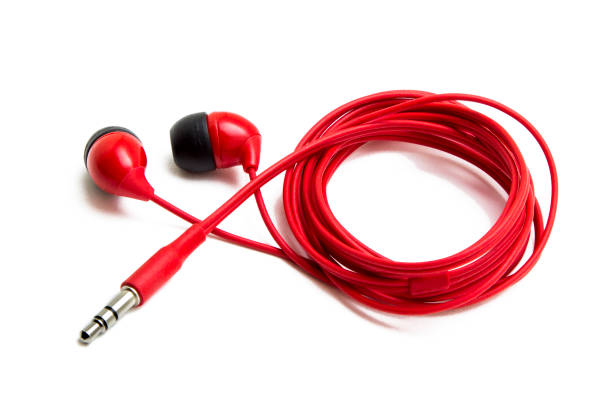 istock In-ear headphones on a white background 842941690