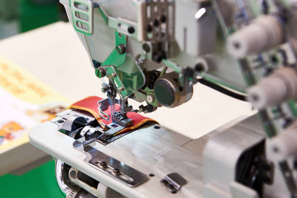 istock Three needle five threaded industrial sewing machine of flat bed 842960002