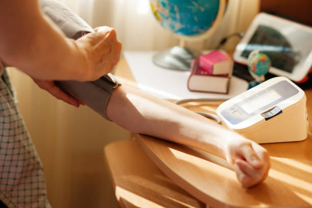 istock People measuring blood pressure 842961460