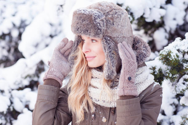 istock Beautiful girl posing in winter scenery. 842971932