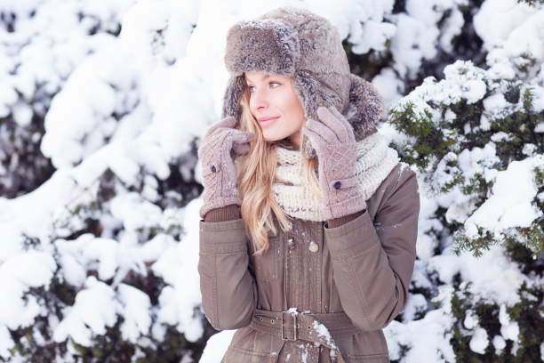 istock Beautiful girl posing in winter scenery. 842972014