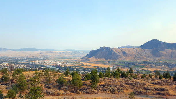 Panorama Of early Morning Kamloops In August Overall high angle view of Kamloops Britisih Columbia kamloops stock pictures, royalty-free photos & images