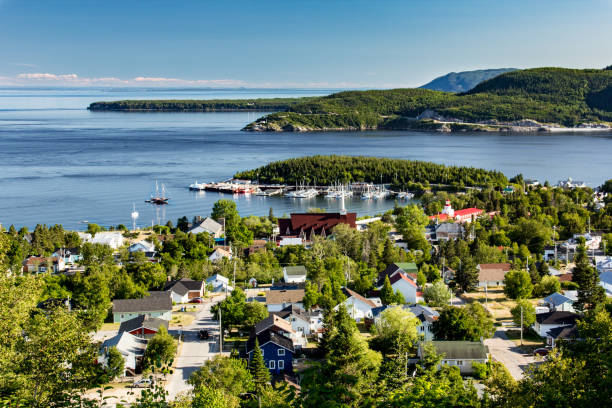 City of Tadoussac, Quebec, Canada Aerial view of City of Tadoussac, Quebec, Canada. Saguenay river and St-Lawrence river. Beginning of Saguenay Fjord charlevoix photos stock pictures, royalty-free photos & images