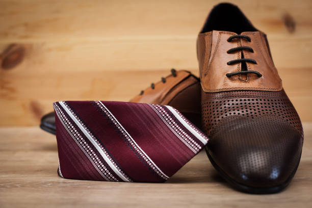 istock Man's style. Male shoes and tie 842977366