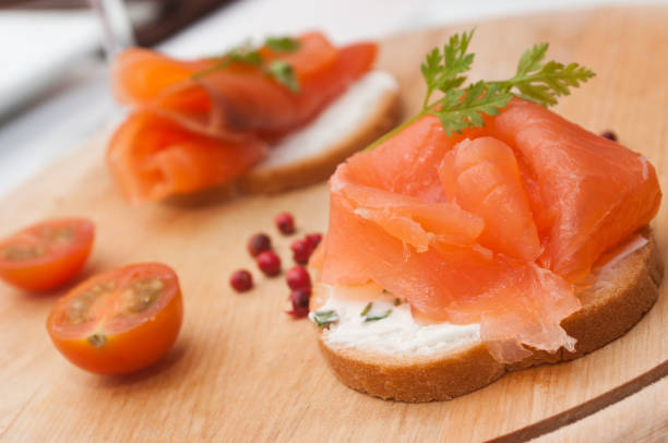 istock salmon toast presentation with cherry tomatoes 842980490
