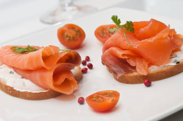 istock salmon toast presentation with cherry tomatoes 842980630