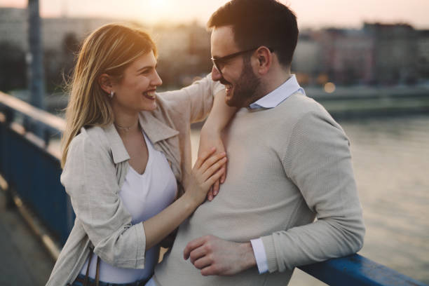 istock Happy romantic couple hugging and smiling 842982910