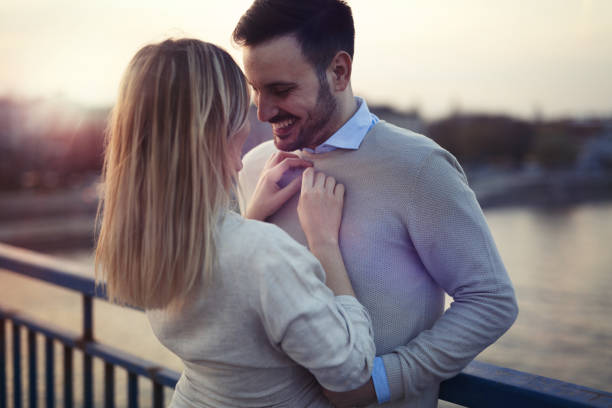 istock Happy romantic couple hugging and smiling 842982922