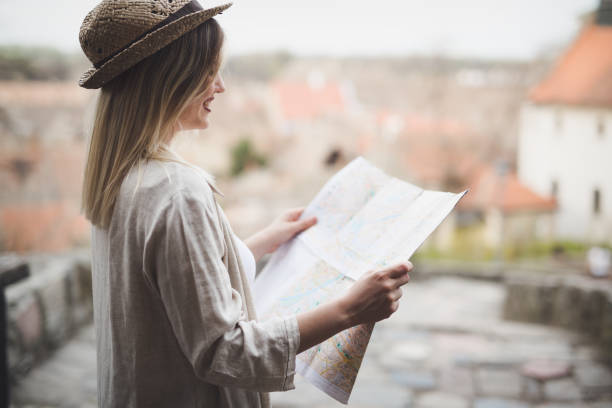 istock Happy female tourist sightseeing and exploring 842982930