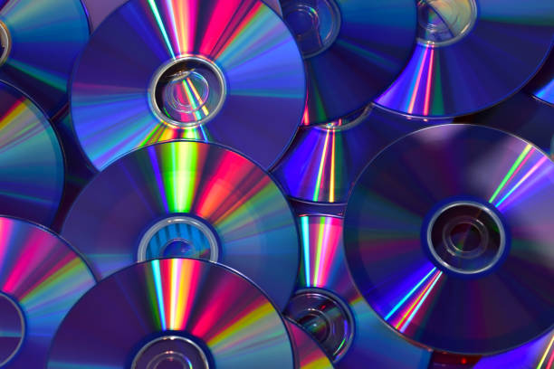 Colorful Computer Disks Abstract Colorful Computer Disks Abstract compact disc stock pictures, royalty-free photos & images