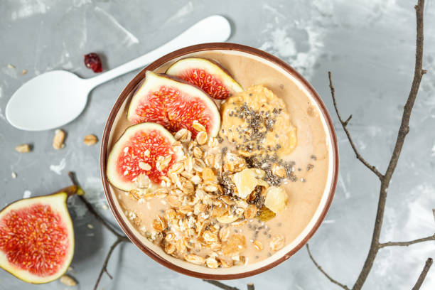istock smoothie bowl with figs, peanut butter and muesli. 842991524