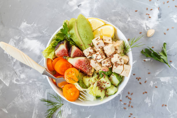 istock vegan lunch, tofu fruit vegetables salad 842996912