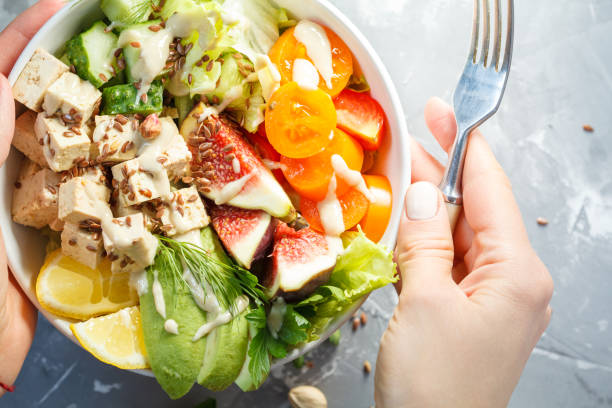 istock vegan lunch, tofu fruit vegetables salad 842997324