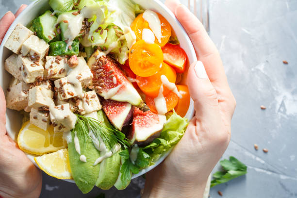 istock vegan lunch, tofu fruit vegetables salad 842997384