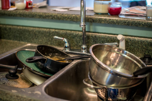 istock Sink of Dirty Dishes 843005426