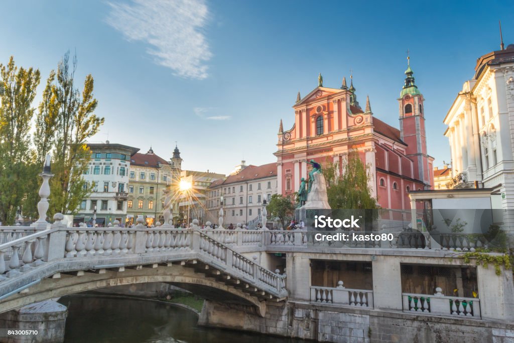 Preseren square and Franciscan Church of the Annunciation, Ljubljana, Slovenia, Europe. Romantic Ljubljana's city center: river Ljubljanica, Triple Bridge, Tromostovje, Preseren square and Franciscan Church of the Annunciation. Ljubljana, Slovenia, Europe. Slovenia Stock Photo