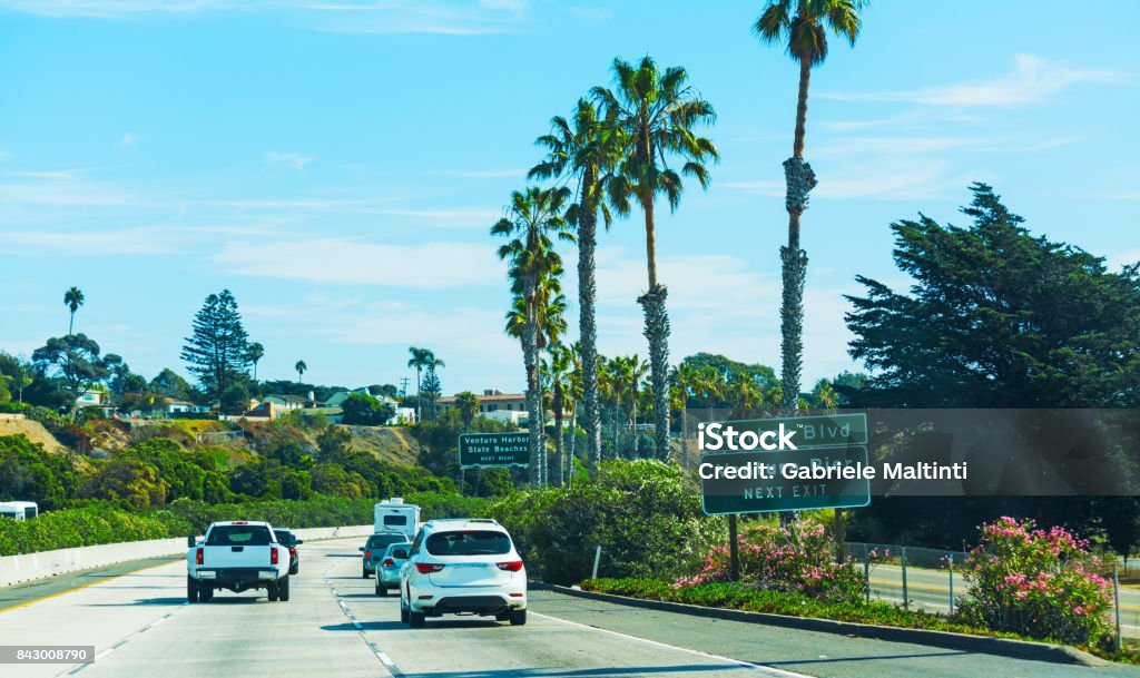 Traffic on pacific coast highway southbound Traffic on pacific coast highway southbound. California, USA American Culture Stock Photo