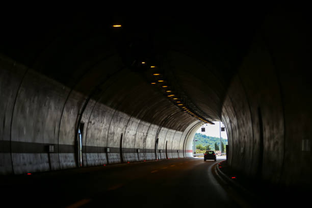 istock Car driving in tunnel 843016778