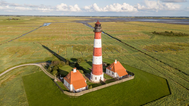 istock Colorful lighthouse at Westerhever, Germany 843020248