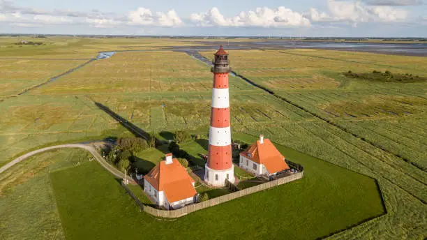 Colorful lighthouse at Westerhever, Schleswig-Holstein, nothern Germany