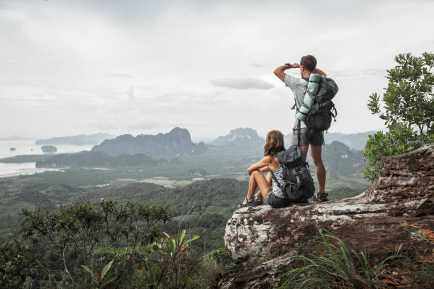istock Two hikers relax on top of a mountain 843022720