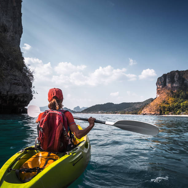 istock Woman paddles kayak 843023094