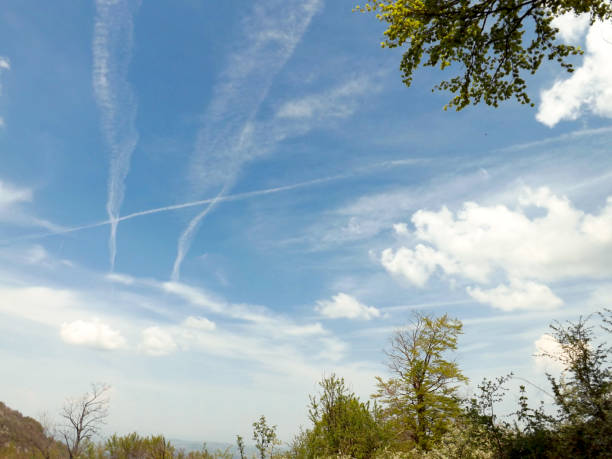 istock Clouds and airplanes marks at the sky 843026216
