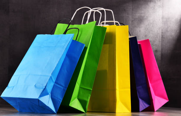 istock Composition with colorful paper shopping bags 843026238