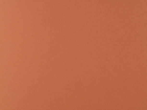 istock Apricot paper texture. Colored textured cardboard 843029540