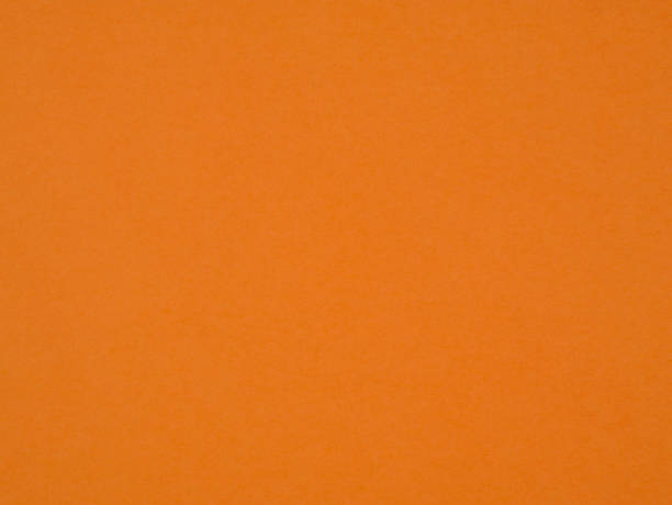 istock Orange paper texture. Small grain. Colored textured cardboard 843029588