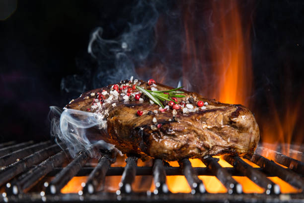 istock Beef steaks on the grill with flames 843029956