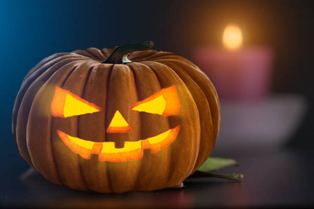 istock Spooky carved pumpkin indoor as Halloween design 843030060