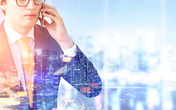 istock Businessman on phone, city office 843037490