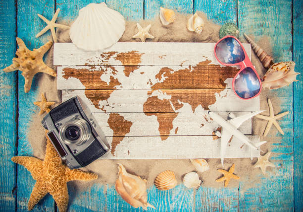 istock Summer traveling time. Sea holiday background with various shells 843040474
