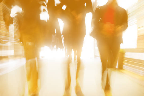 istock People leaving office in the evening sunset 843040716