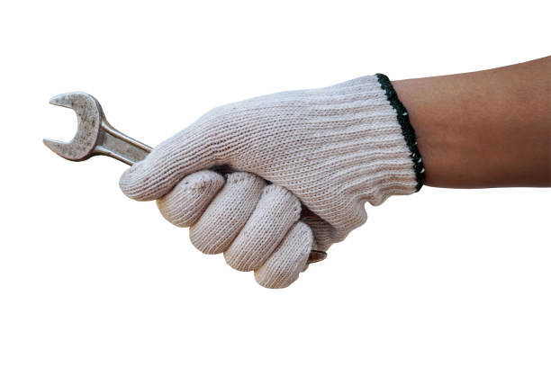 istock Mechanic hand hold wrench tool in hand isolated on white 843051820
