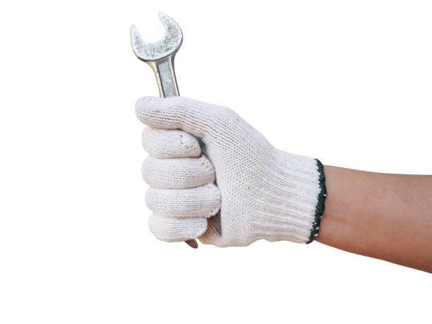 istock Mechanic hand hold wrench tool in hand isolated on white 843051838
