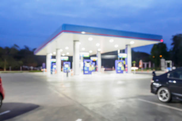 istock Blur Gas station at night time for background 843051890