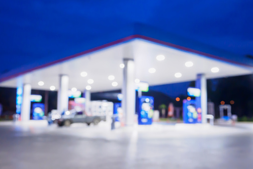Blur Gas station at night time for background