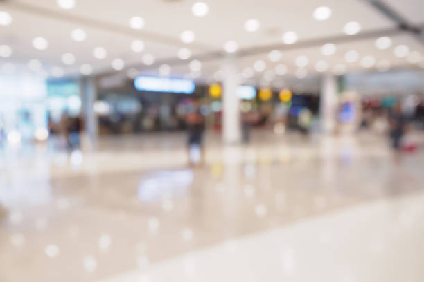 istock Abstract blur defocused shopping mall interior background 843051956